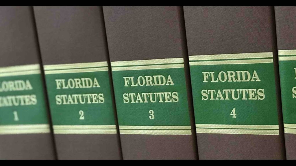 Photo of four books that make up part of The Florida Statutes